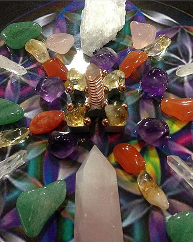A table showing an array of colorful crystals and gemstones.